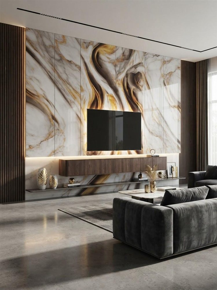 White and gold swirl marble TV feature wall in luxury living room with dark leather sofa