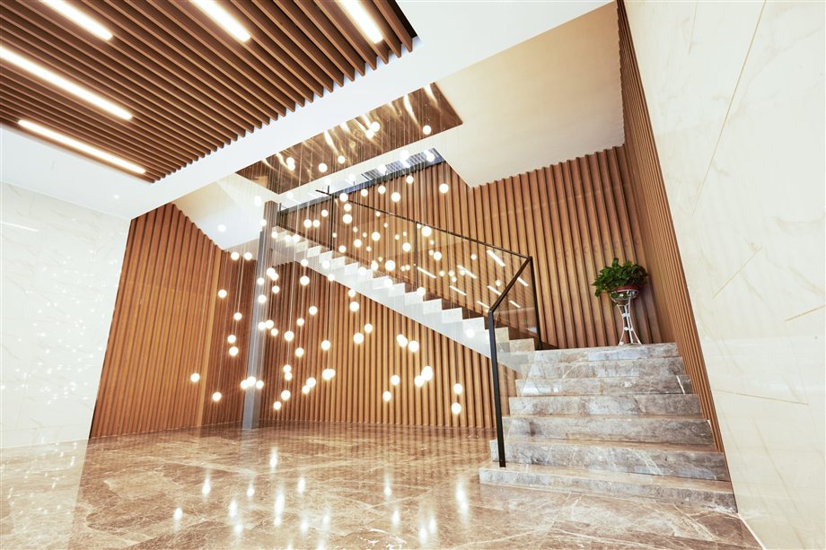 WPC feature wall — luxury staircase installation