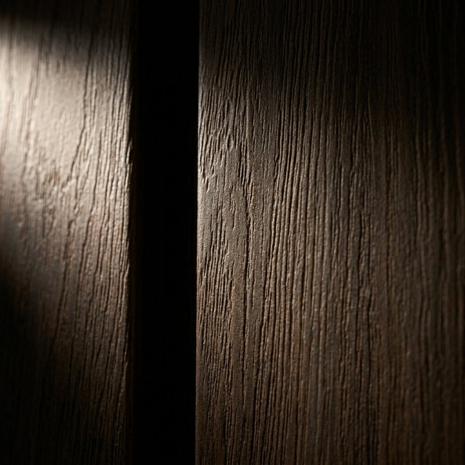 Dark charcoal WPC panel texture — close-up detail